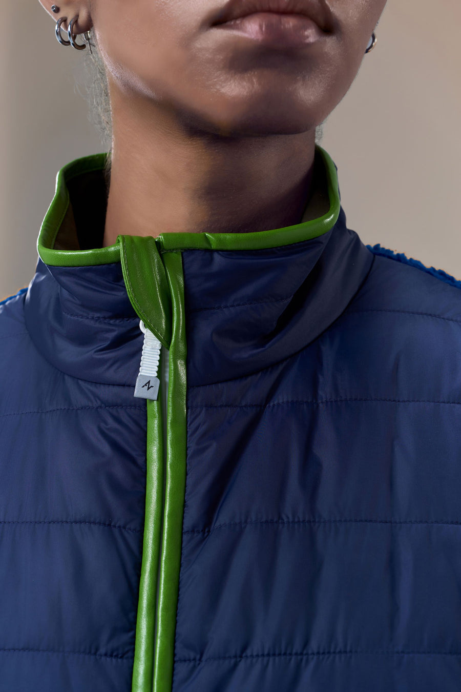 Neige Contoured Recycled Nylon and Fleece Vest with Sustainable Padding and Detachable Coin Purse