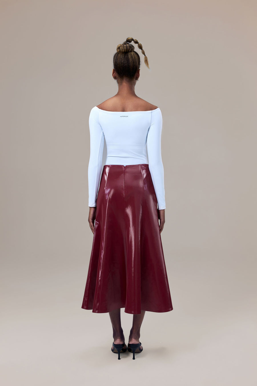 Rhodes Glossy Water-Resistent Knee-Length Skirt with Side Pockets