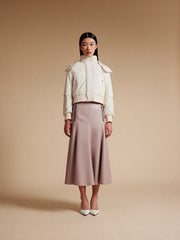 model wear pink vegan leather skirt and bomber jacket