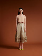 model wear Beige see through top long sleeve