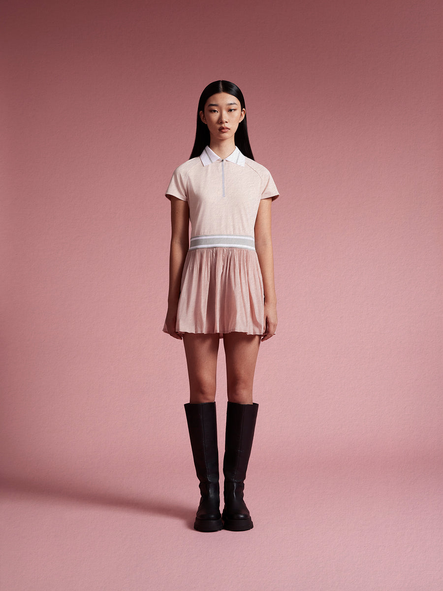 model wear pink tennis dress
