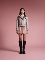 model wear pink bomber jacket with skirt