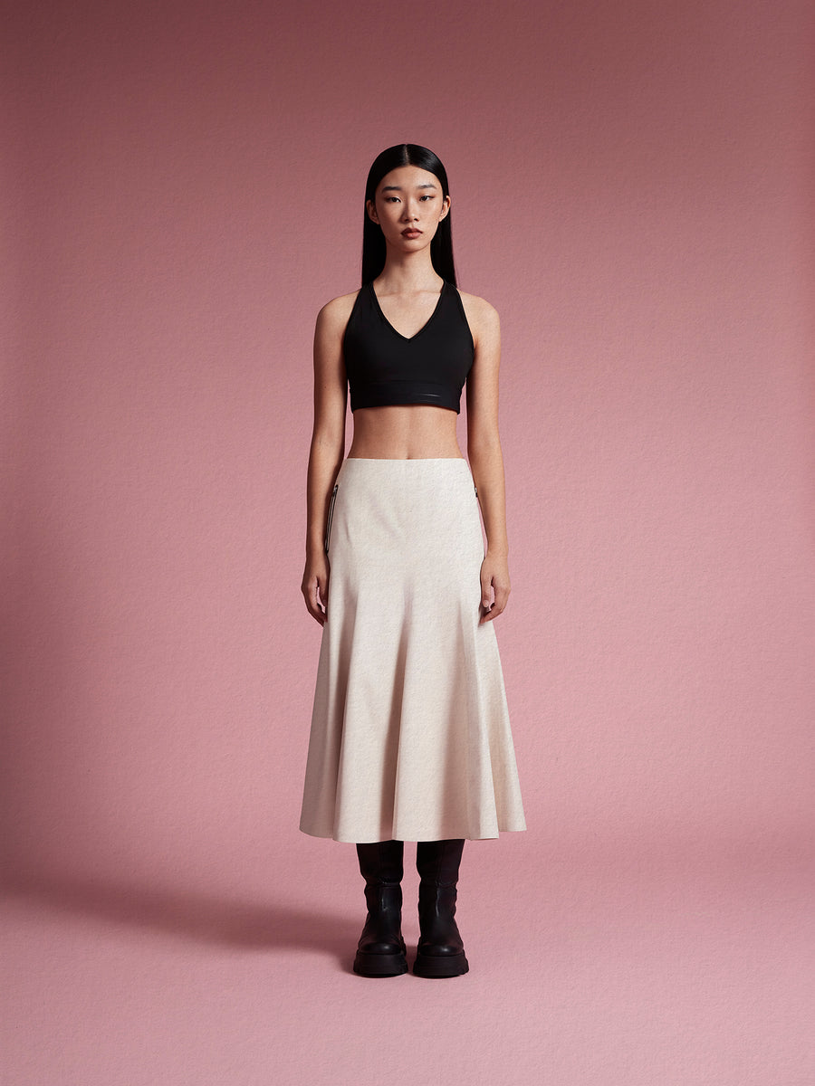 model wear white vegan leather Skirt