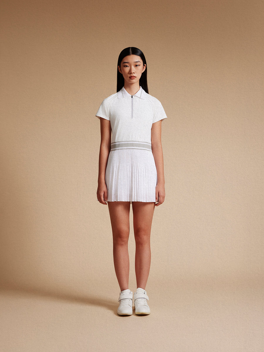 model wear white tennis dress