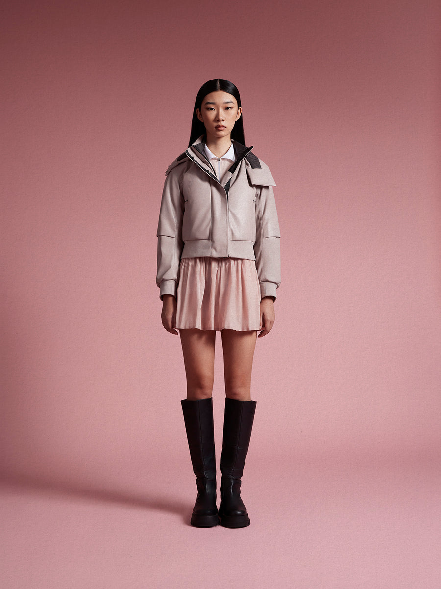 model wear pink bomber jacket with skirt